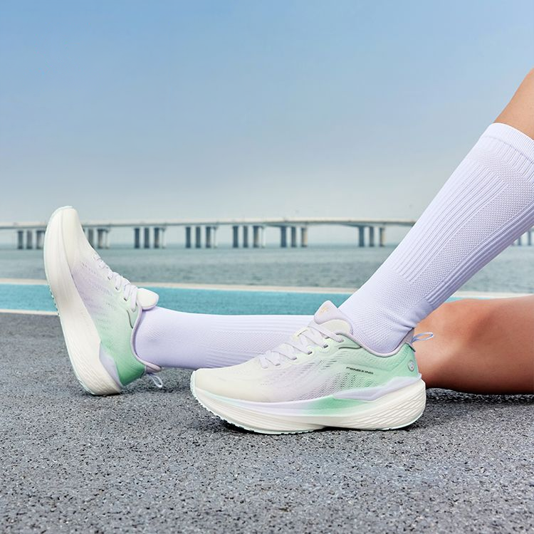 QIAODAN Cushioning Slip Resistant Low top Casual Running Shoes Women’s White Green Purple