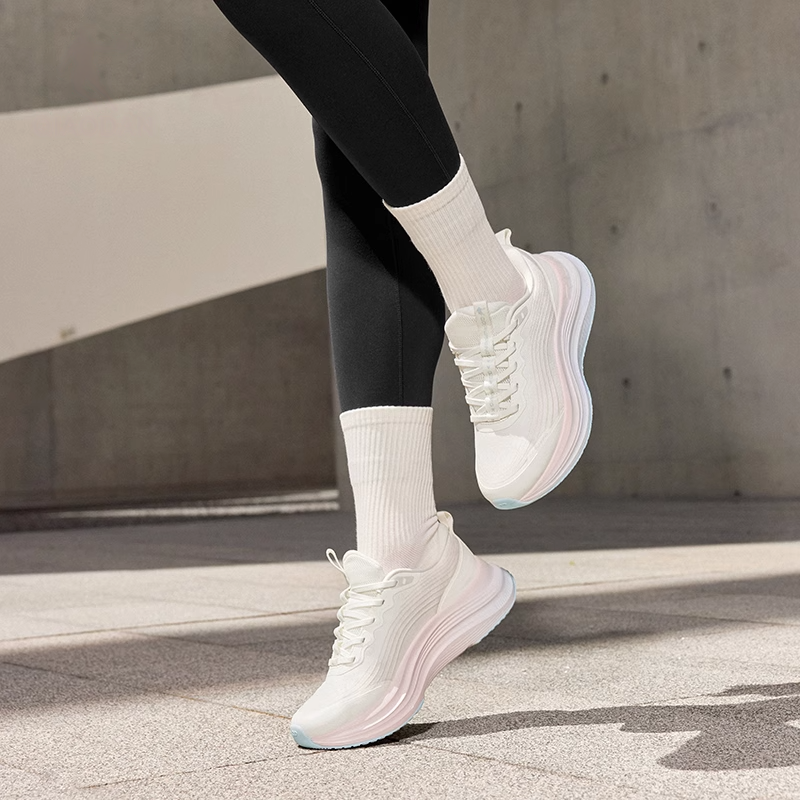 QIAODAN Non slip Lightweight Low top Running Shoes Women’s White Pink