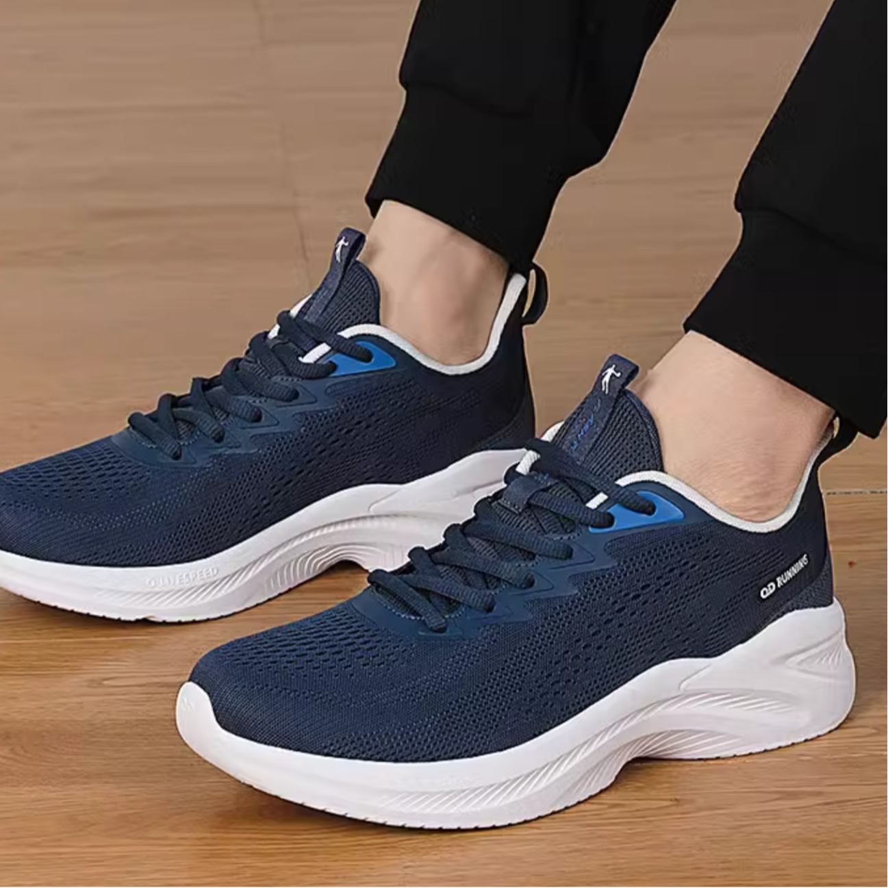 QIAODAN Mesh Cushioning Slip Resistant Low top Running Shoes Men’s Blue