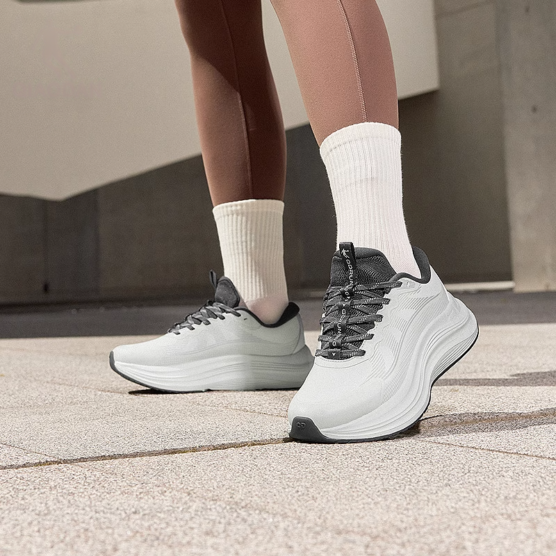 QIAODAN Cushioning Slip Resistant Low top Casual Running Shoes Women’s White Black