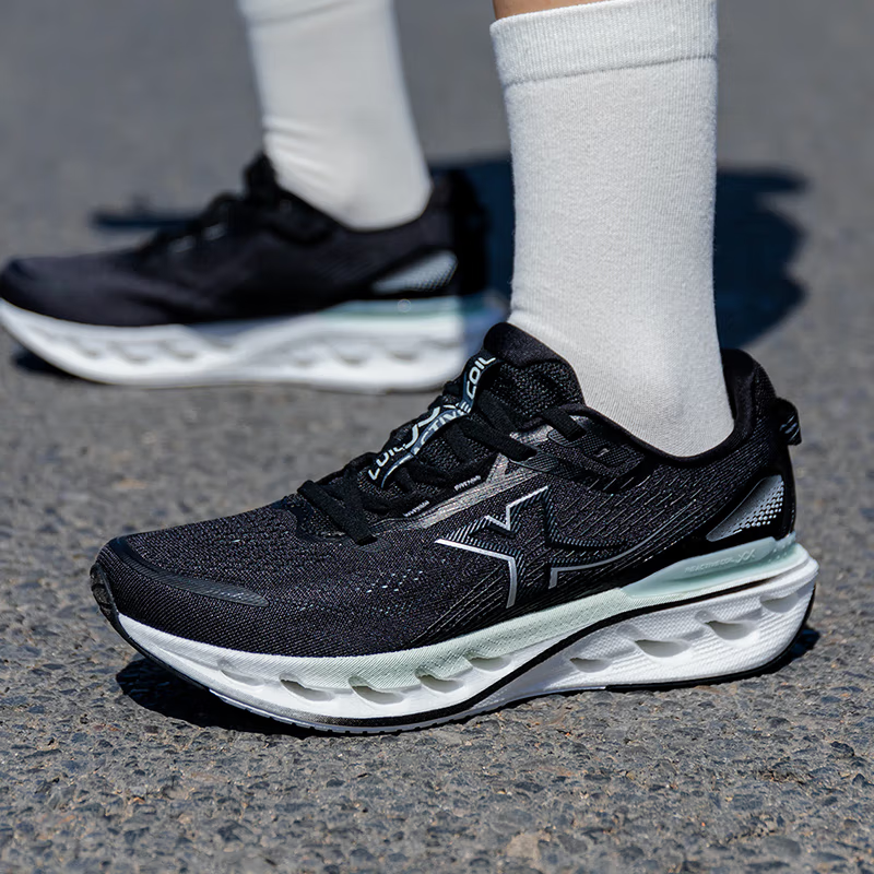 XTEP Slip Resistant Abrasion Resistant Low top Casual Running Shoes Women’s Black White