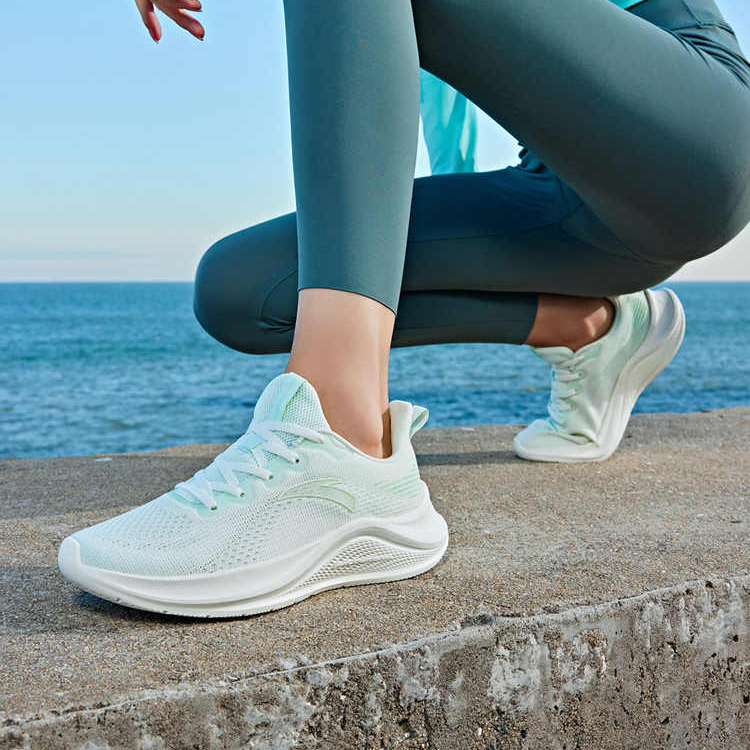 Anta Flyknit Wander Slip Resistant Abrasion Resistant Low top Sprint Running Shoes Women’s White Green
