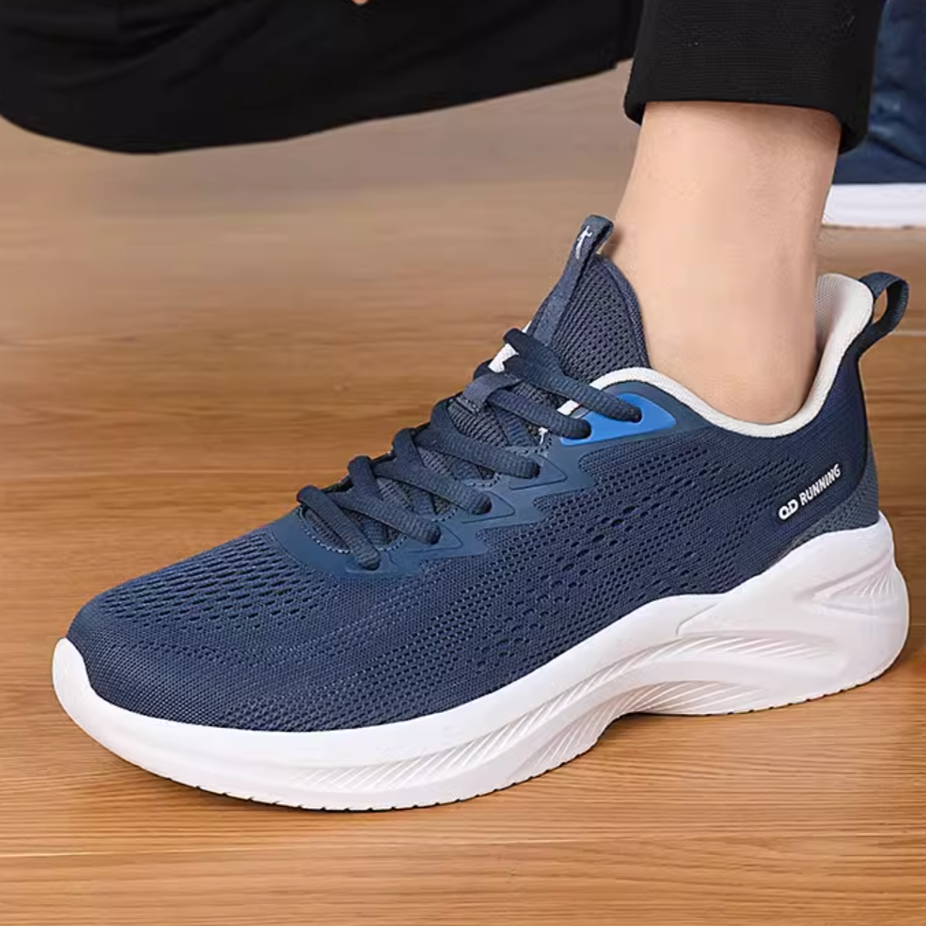 QIAODAN Mesh Cushioning Slip Resistant Low top Running Shoes Men’s Blue