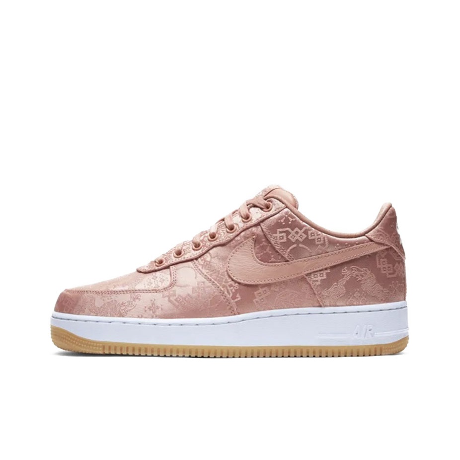 nike rose gold slippers