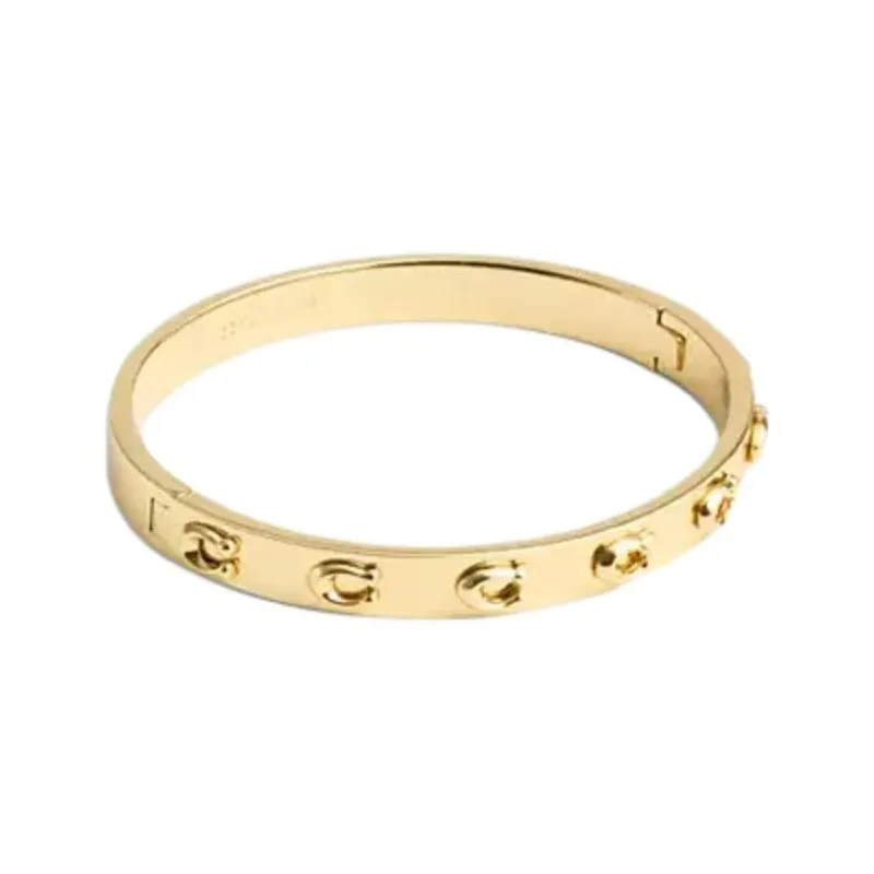 COACH Браслеты из латуни с золотым покрытием женские