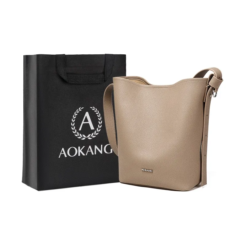 AOKANG Корова Кожа Ведрообразная Сумка Плечевая Сумка Средний Женская Тренч Серый Печенье Цвет Классический Черный