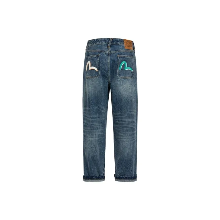 EVISU Slogan print Tapered leg Jeans