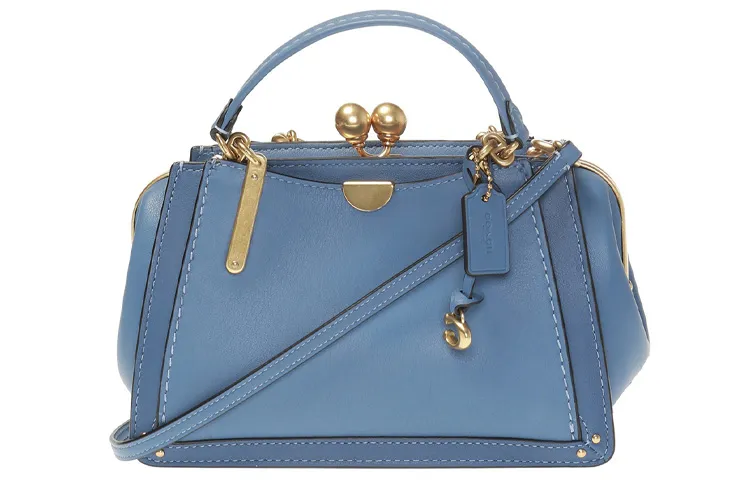 COACH Kisslock Handbags