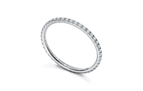 TIFFANY & CO. Tiffany, carved platinum diamond ring with letters
