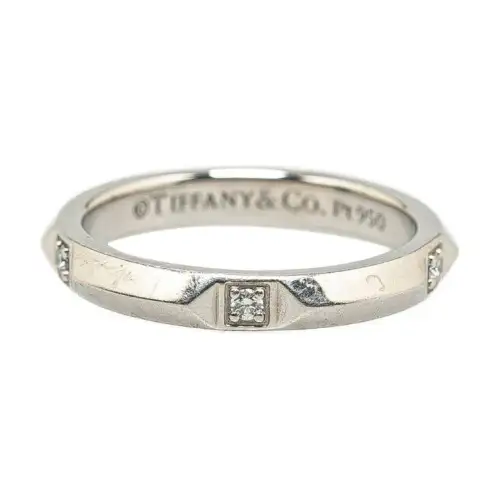 TIFFANY & CO. Tiffany, carved platinum diamond ring with letters