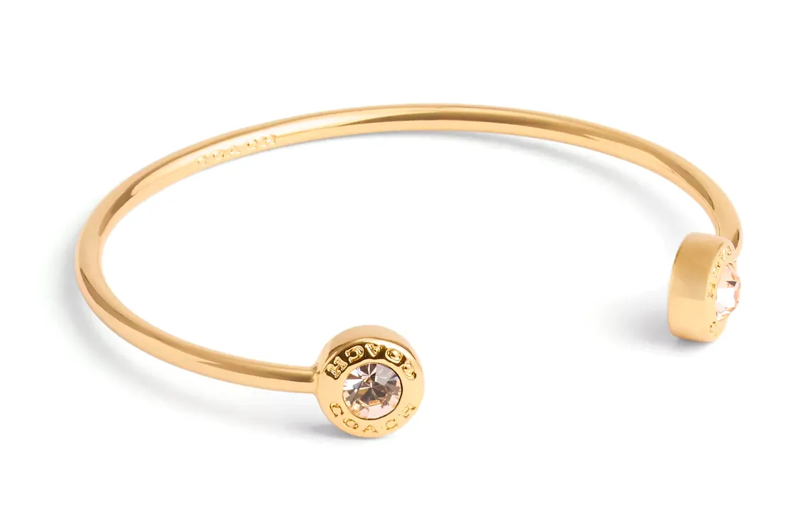 COACH Cubic Zirconia, Glass, Brass Plated Bangles Women's Gold