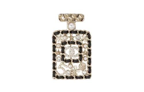 CHANEL Classic perfume, golden brooch, women's style
