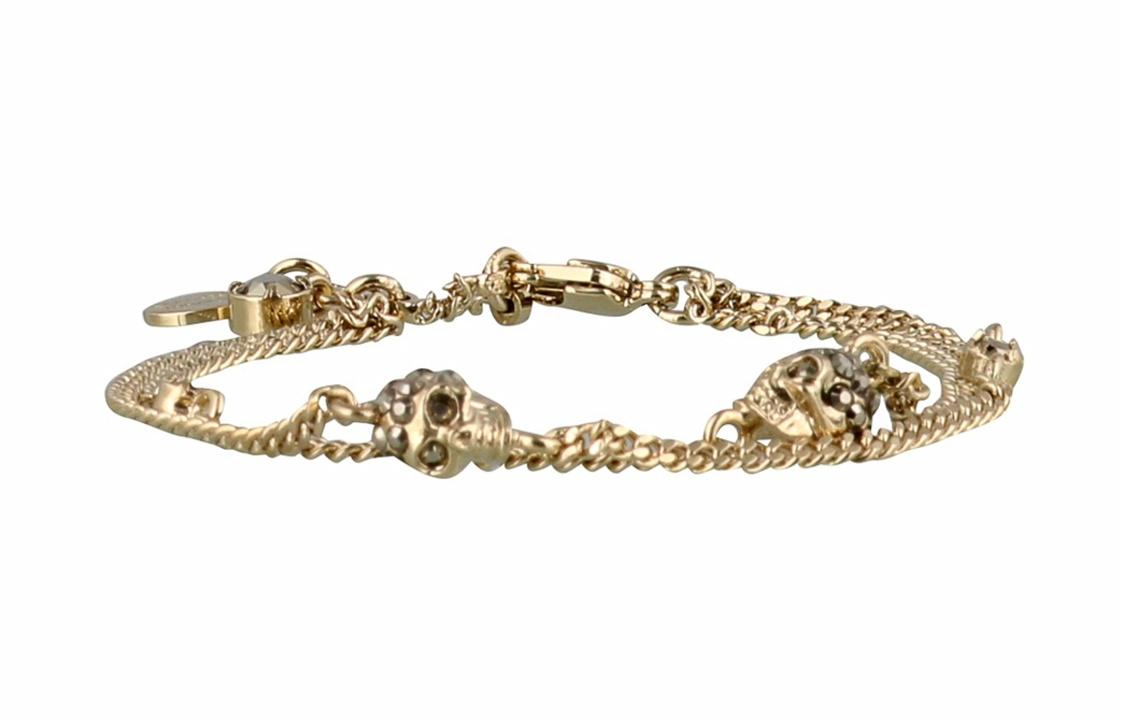 Женский браслет Alexander McQueen латунный двухвитковый с черепом (золотой)