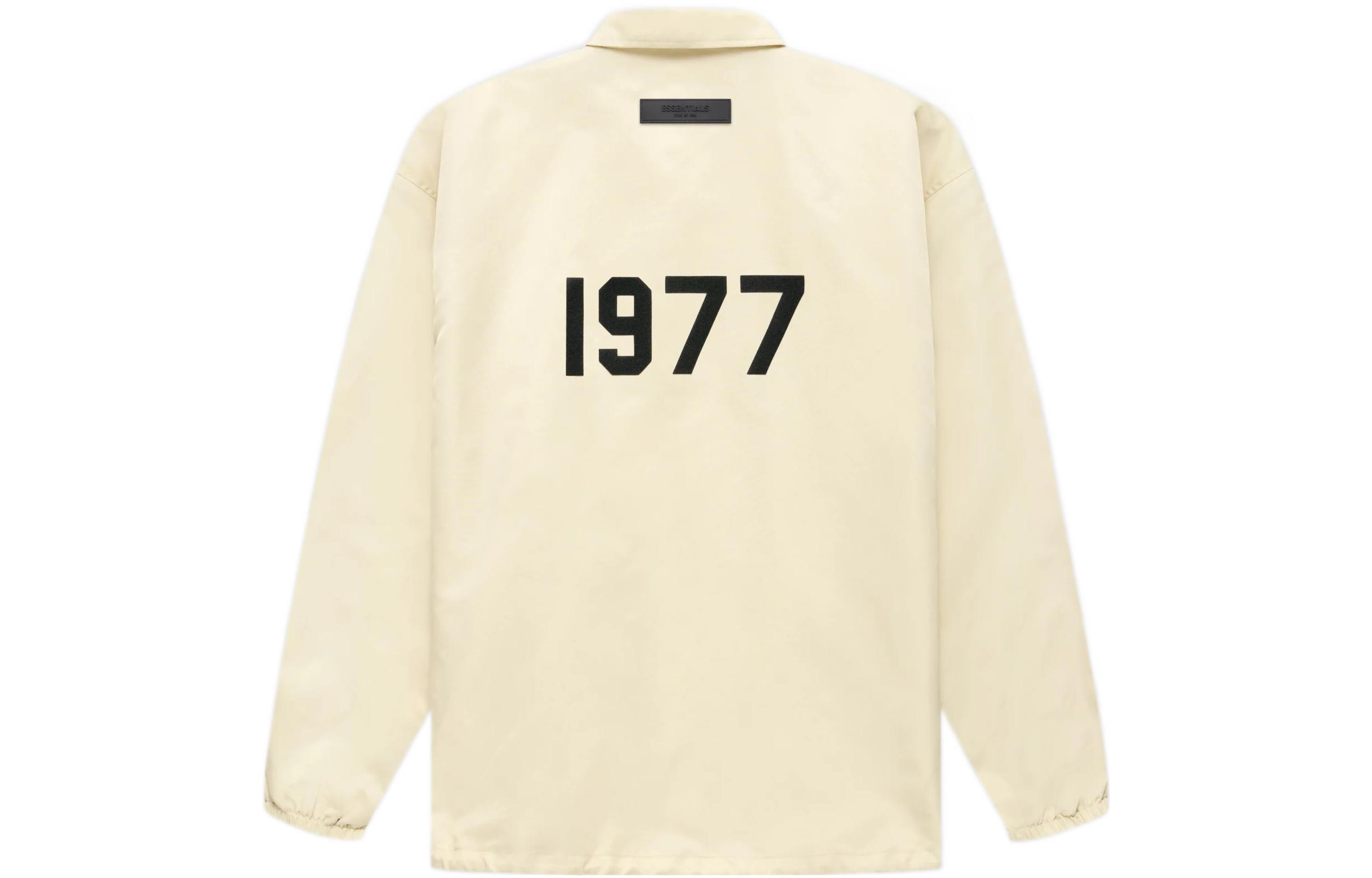 Fear of God Essentials 1977 Series FW22 Nylon Coaches Jacket Egg shell Solid Color Logo Lapel Windproof Button Coach American Heavy Jacket Jacket Same Style for Men and Women Eggshell White