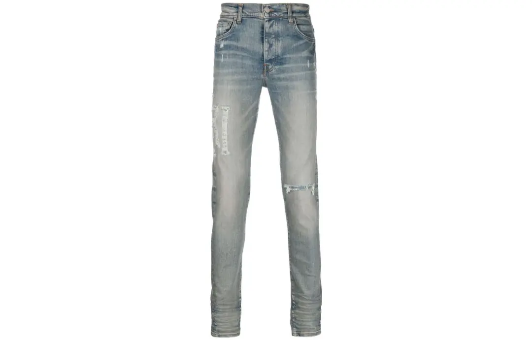 Amiri logo-embroidered skinny-cut jeans