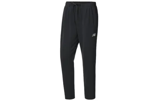 New Balance Joggers & Sweatpants Knitted Sweatpants Men's Black Moderate Straight Fit Pants