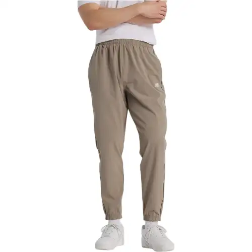 New Balance SS25 Sports Pants Men's Brown