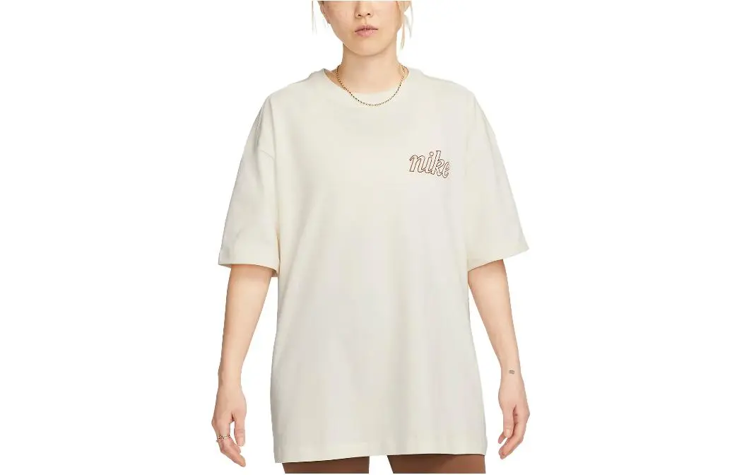 Nike Women'ss Logo Cartoon Crewneck Pullover T-Shirt Beige