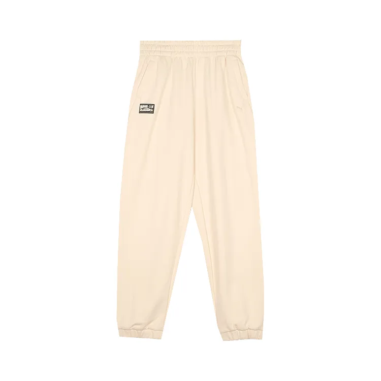PUMA CLASSICS Fleece Lined Thermal Loose Fit Elastic Cuff Knitted Sweatpants Women's Almond Candy