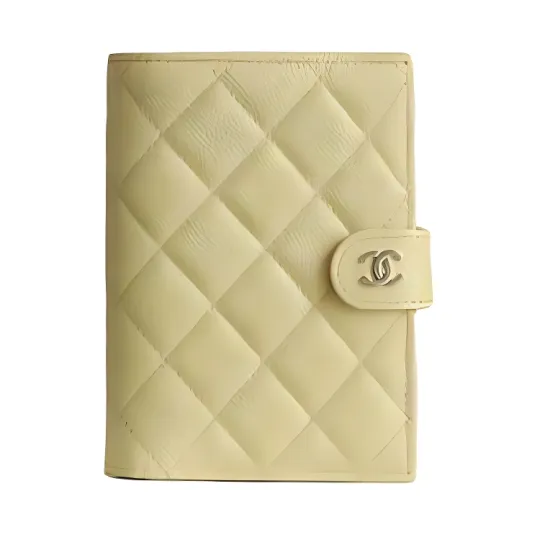 CHANEL Shiny Grain Calfskin & Gold Metal Passport Holder Small Women's Yellow