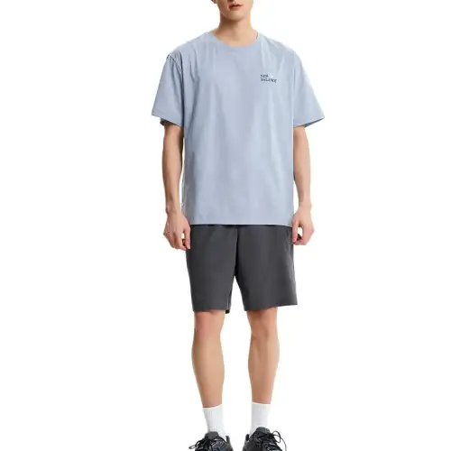 New Balance UNI FROZENSEMI Over FIT T Shirt Unisex 51 Light Blue