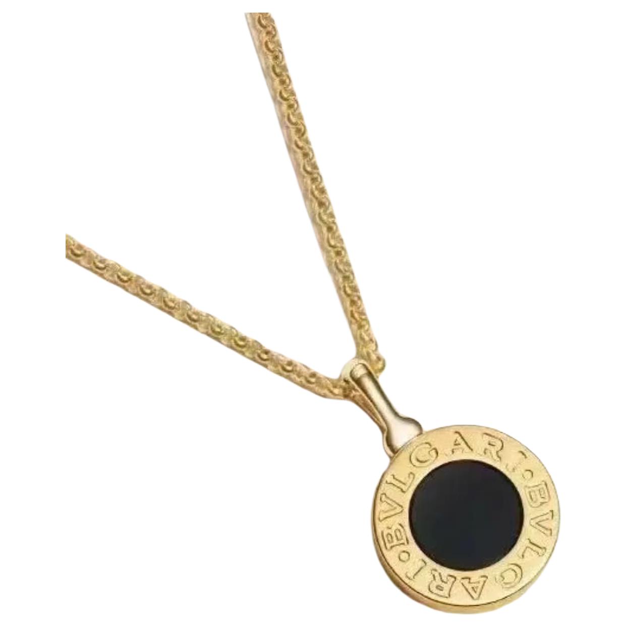 Bvlgari onyx yellow gold pendant