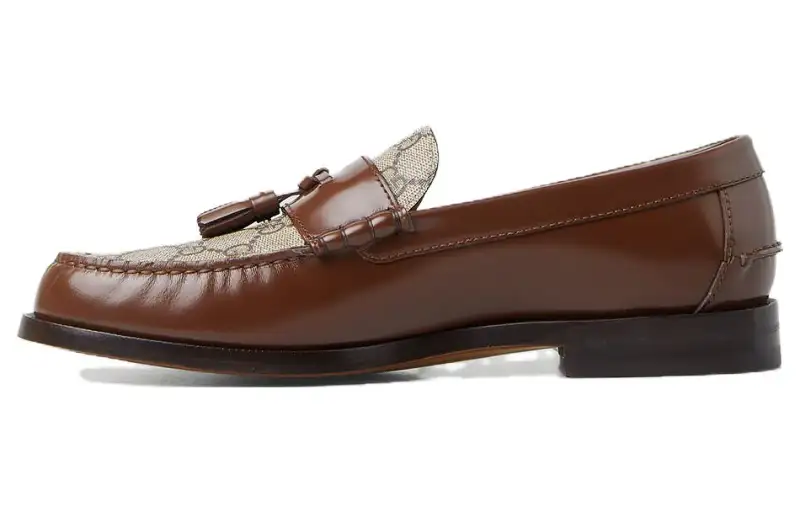 GUCCI Tassel-detail GG Canvas Loafers