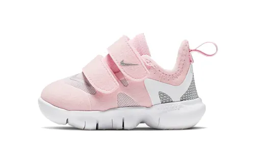 Nike Free RN 5.0 low top running shoes pink infant and toddler