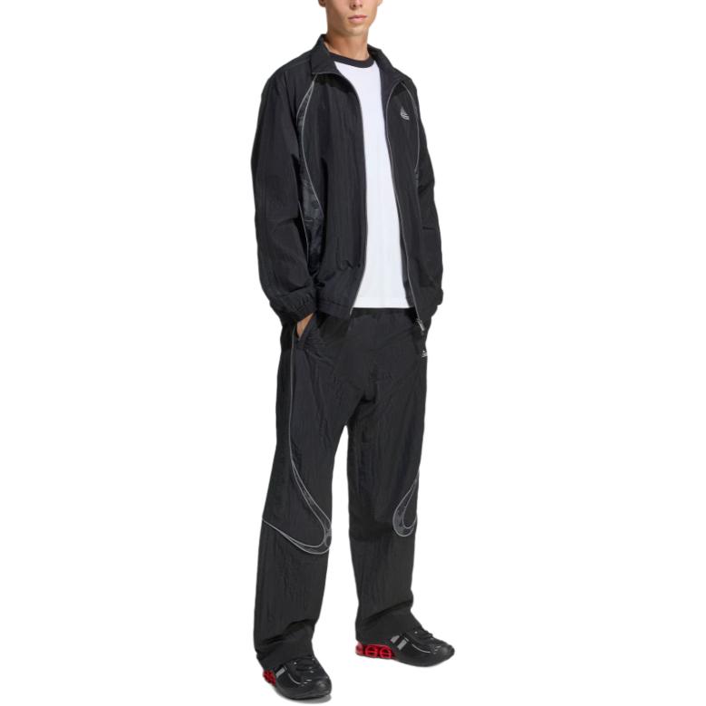 Adidas elasticated curved-line trousers