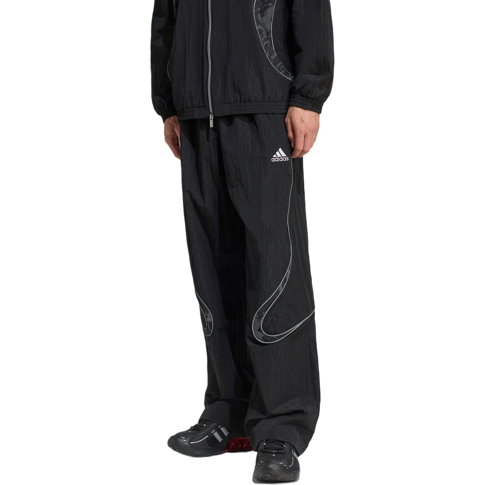 Adidas elasticated curved-line trousers
