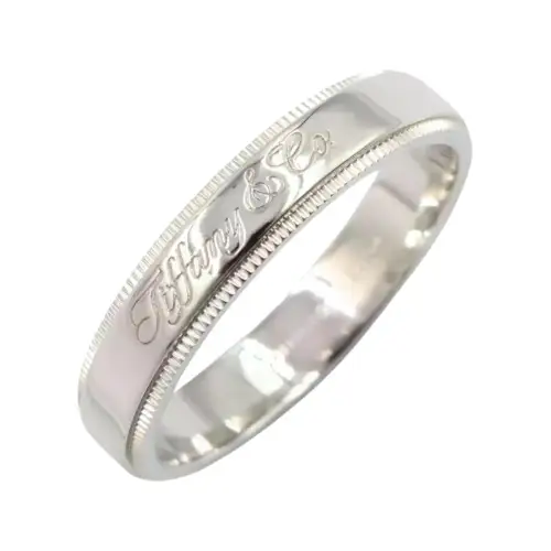 TIFFANY & CO. Tiffany, carved design platinum ring, with your logo imprint
