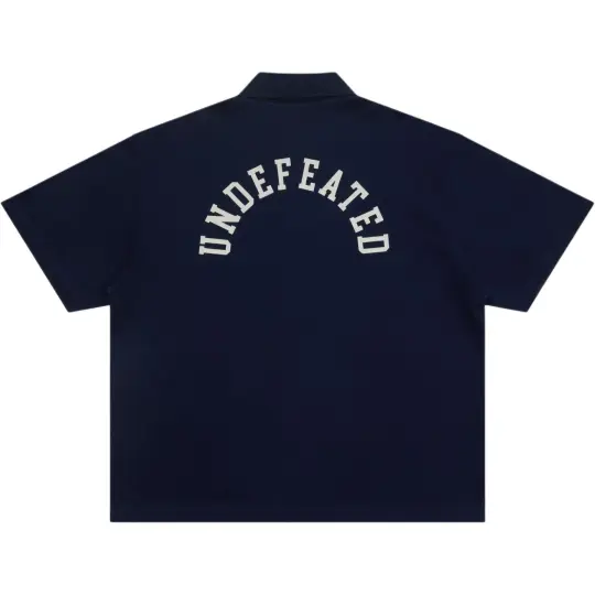UNDEFEATED SS26 Пятиполосная спортивная рубашка-поло с короткими рукавами и буквами логотипа на спине, одинаковый стиль для мужчин и женщин