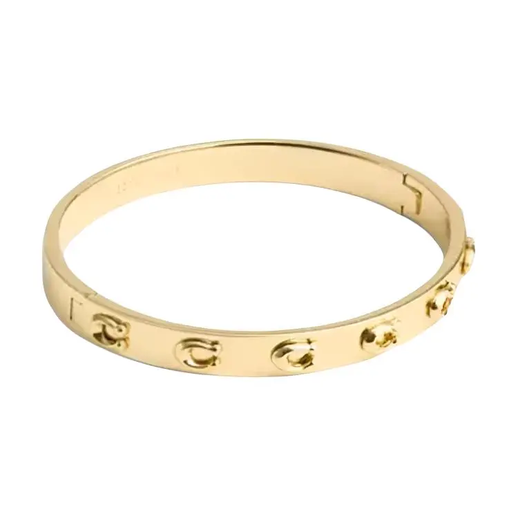 COACH Brass Plated Bangles Women's Gold