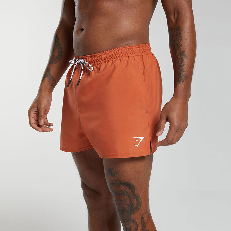 GYMSHARK 3′ SWIM SHORTS Swimming Shorts Men’s Orange