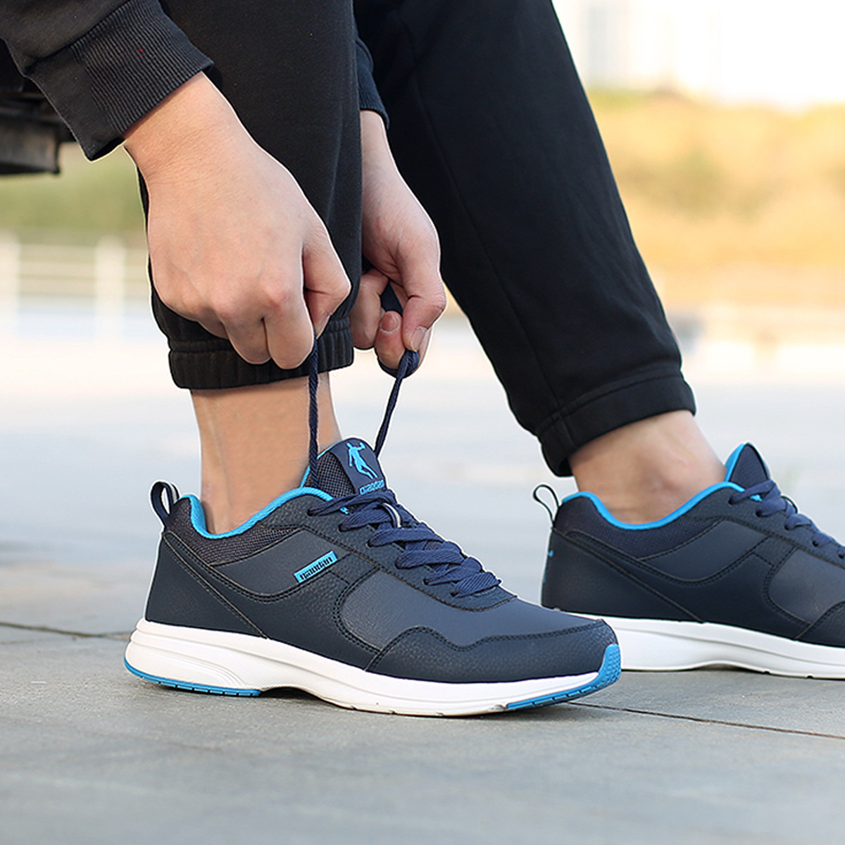 QIAODAN Slip Resistant Abrasion Resistant Low top Casual Running Shoes Men’s Blue Black