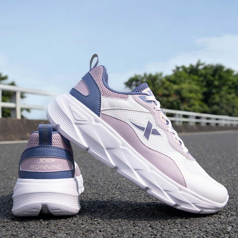 XTEP Breathable And Resilient Low top Casual Running Shoes Women’s White Purple