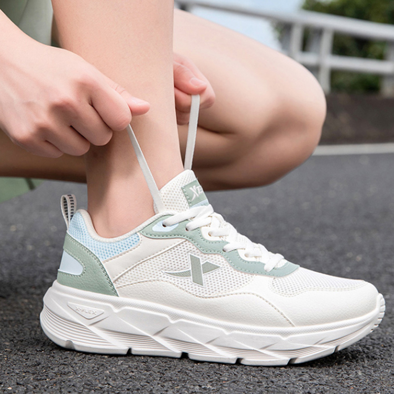 XTEP Breathable And Resilient Low top Casual Running Shoes Women’s White Green