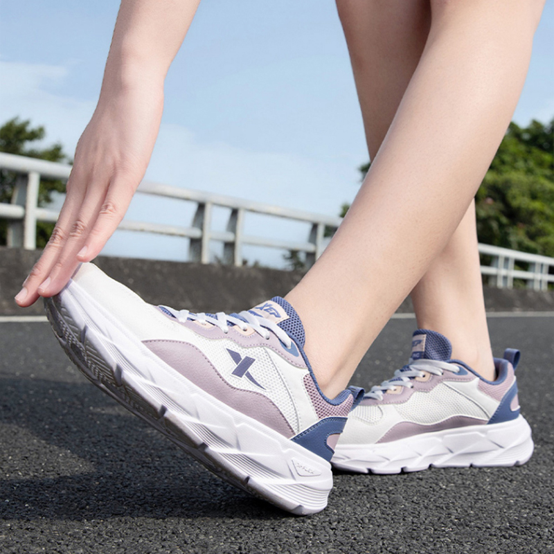 XTEP Breathable And Resilient Low top Casual Running Shoes Women’s White Purple