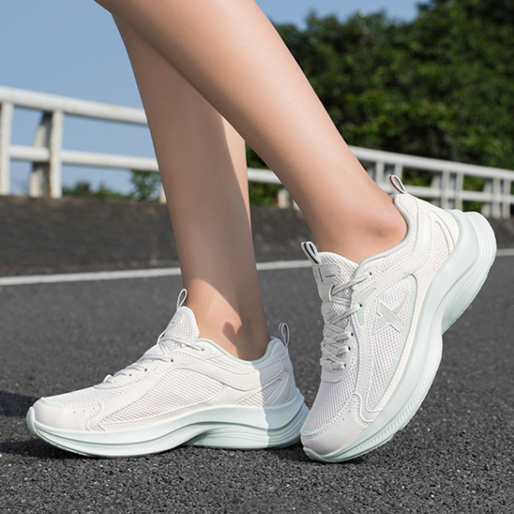XTEP Breathable And Lightweight Low top Casual Running Shoes Women’s White Green