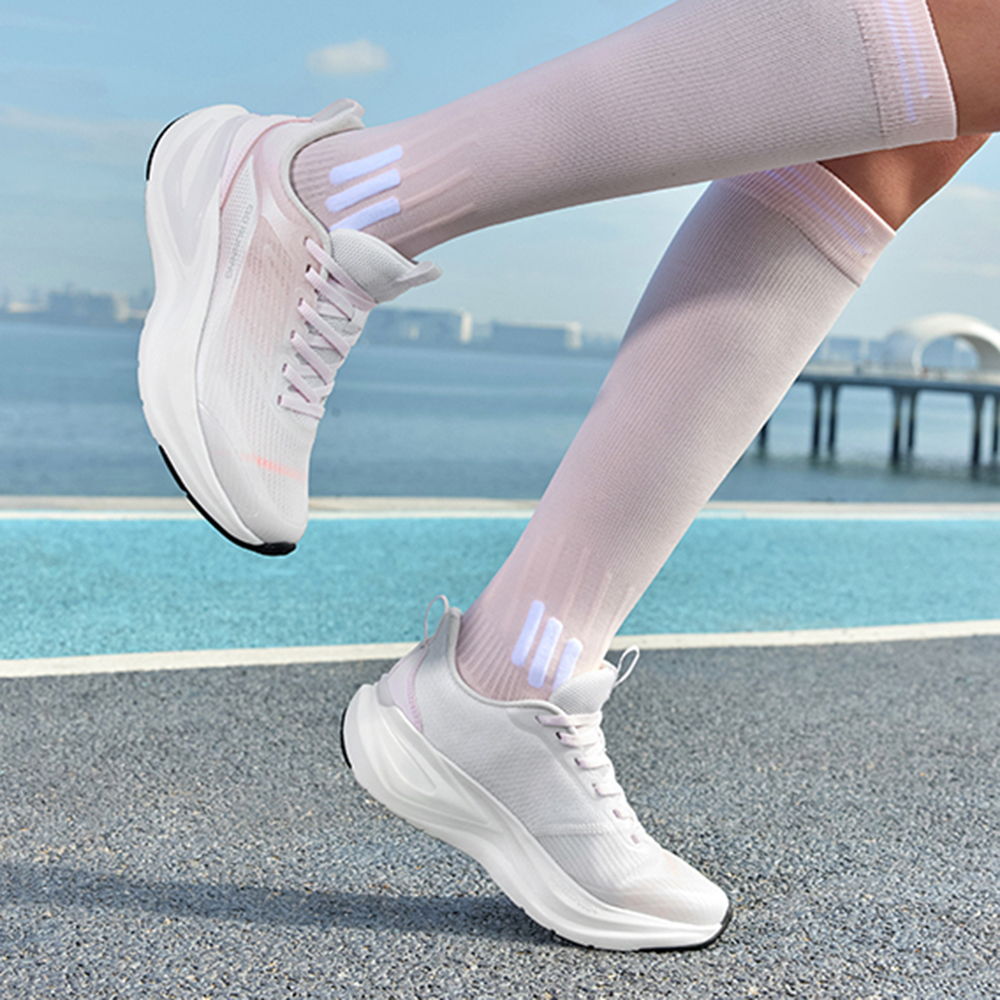 QIAODAN Breathable And Lightweight Low top Casual Running Shoes Women’s White Pink