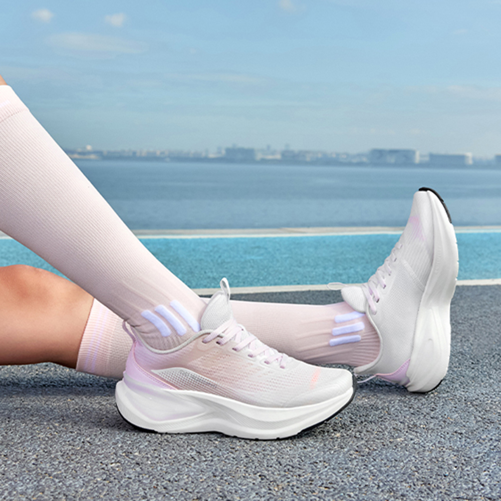 QIAODAN Breathable And Lightweight Low top Casual Running Shoes Women’s White Pink