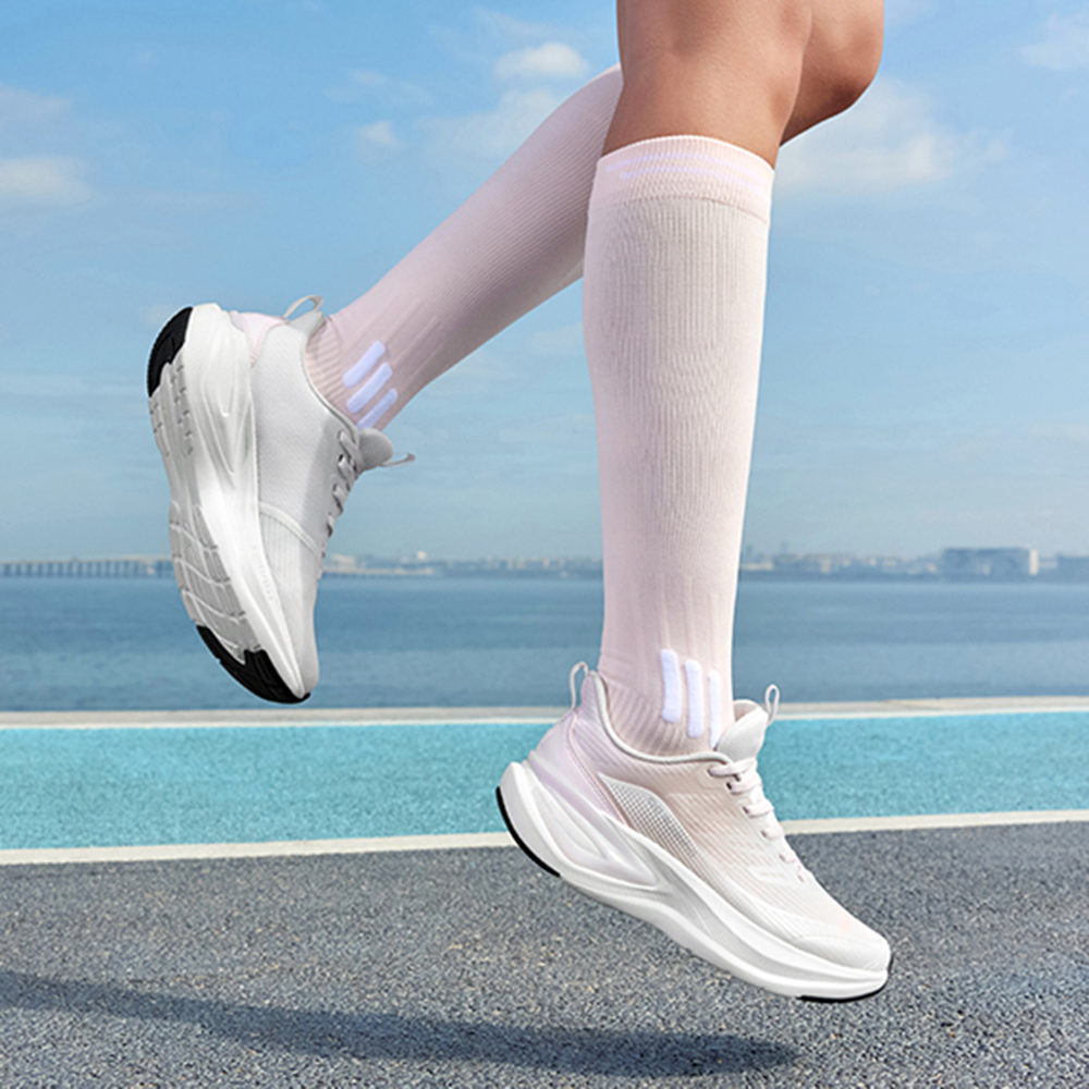 QIAODAN Breathable And Lightweight Low top Casual Running Shoes Women’s White Pink