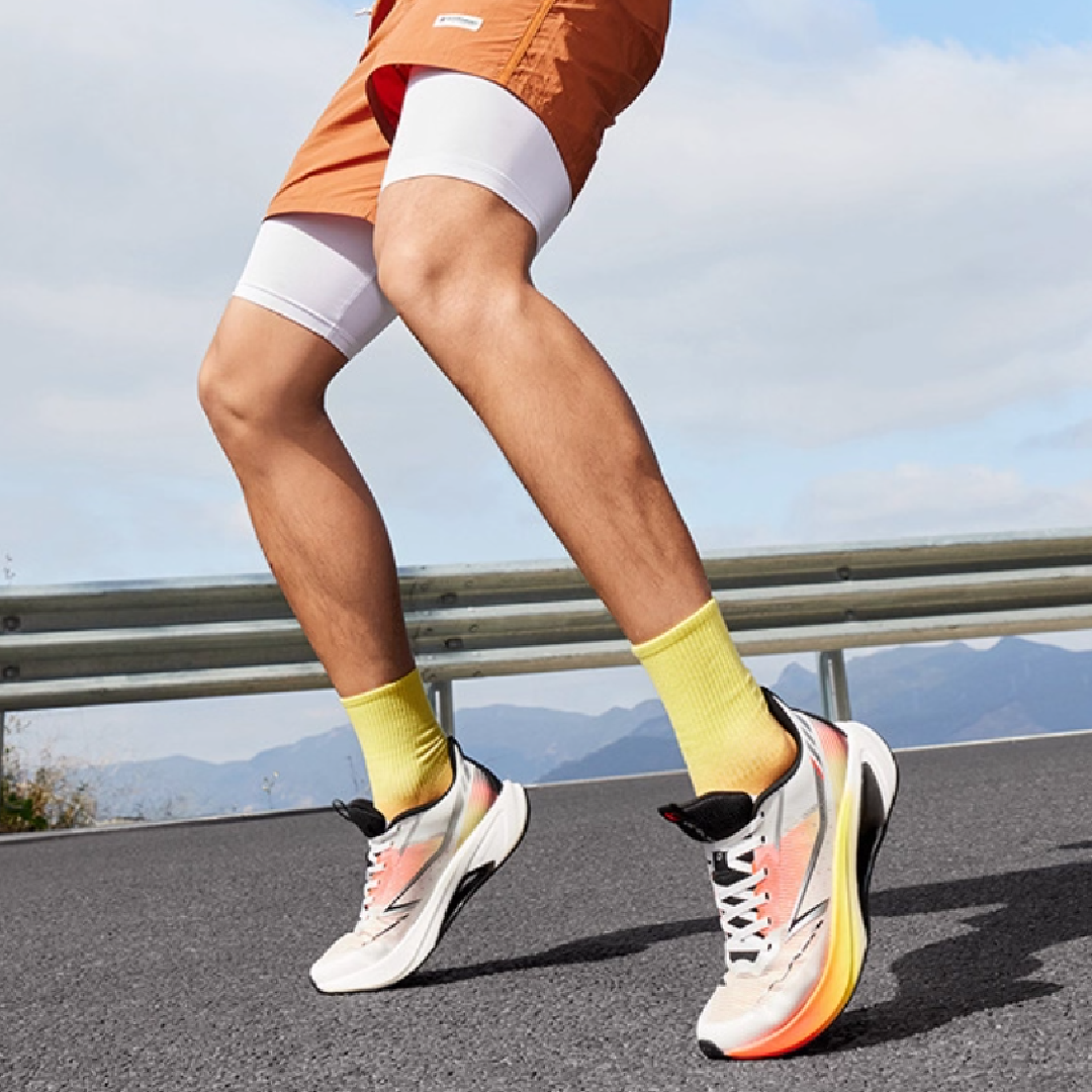 QIAODAN Cushioning Abrasion Resistant Lightweight Low top Casual Running Shoes Men’s White Orange Yellow