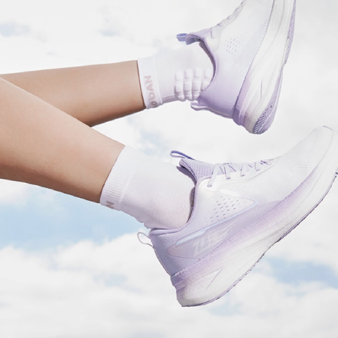 QIAODAN Swift Lite Cushioning Slip Resistant Low top Casual Running Shoes Women’s White Purple