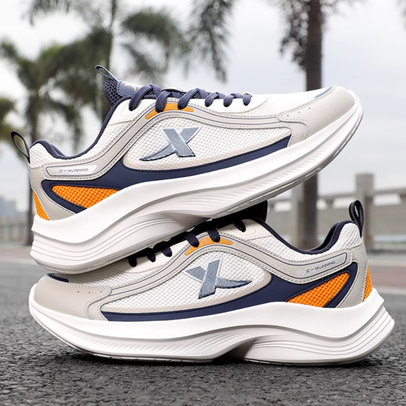 XTEP Abrasion Resistant Breathable Cushioning Low top Casual Running Shoes Men’s White Gray Blue