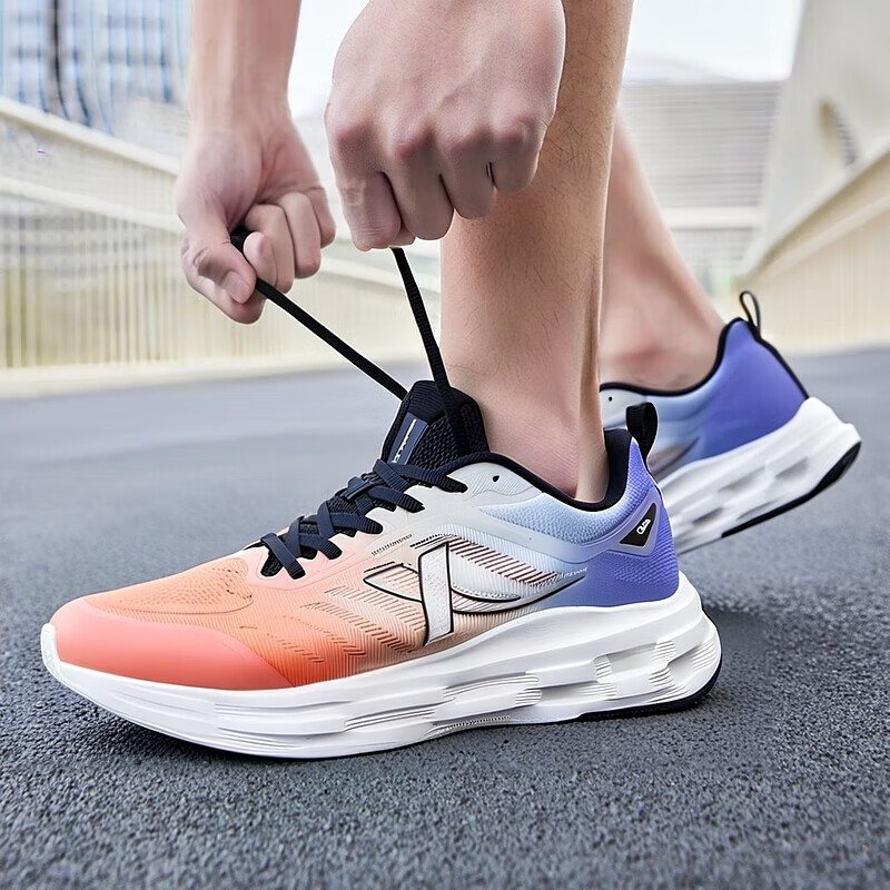 XTEP Breathable And Lightweight Low top Running Shoes Men’s Orange White Blue