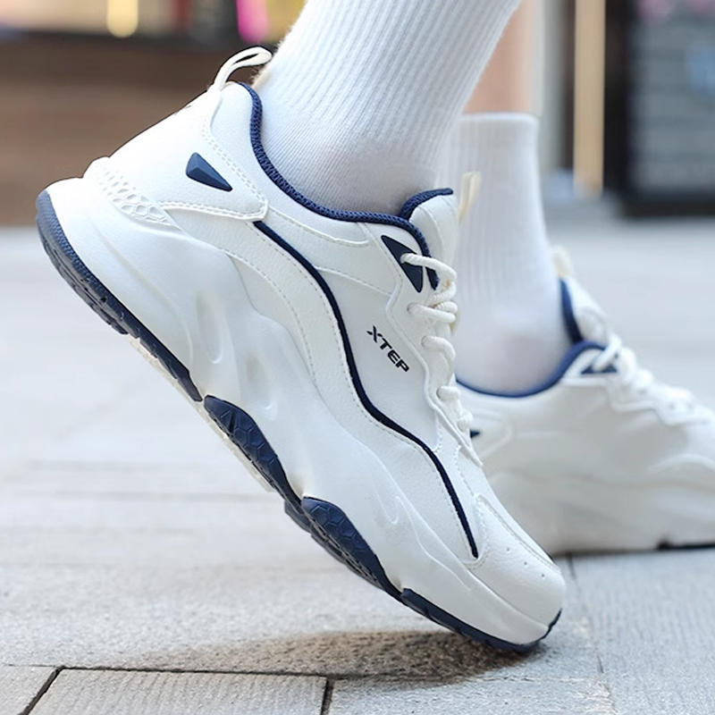 XTEP Comfortable Cushioning Breathable Low top Sprint Running Shoes Women’s White Blue