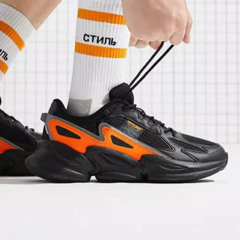 QIAODAN Slip Resistant Mid top Running Shoes Men’s Sun Orange