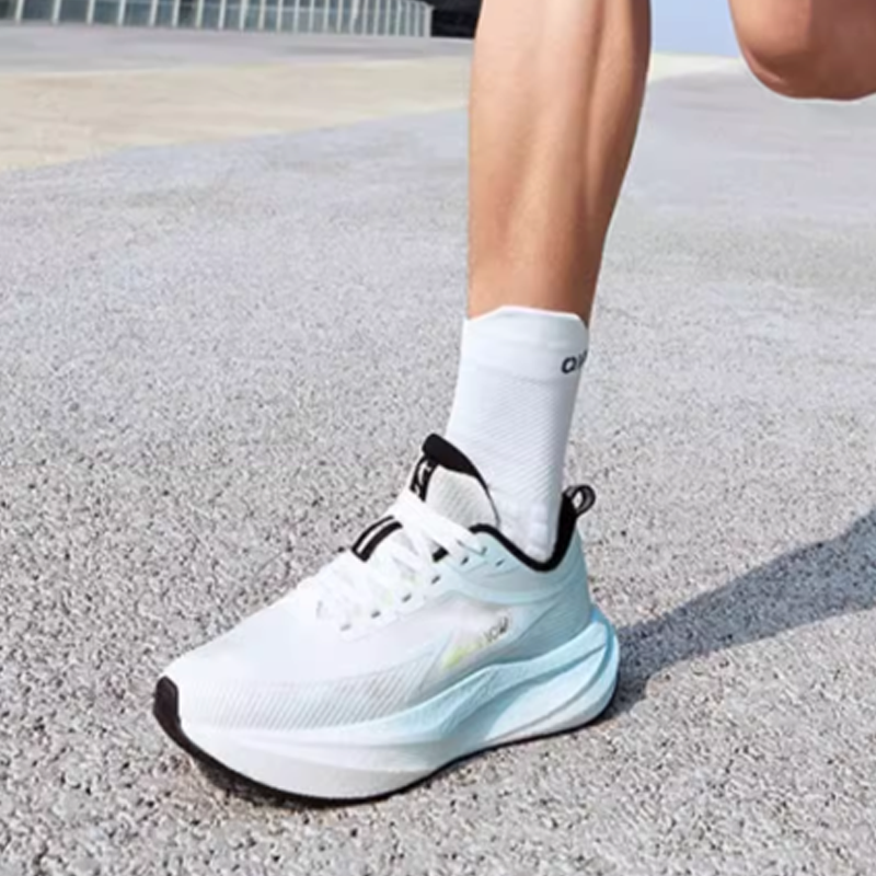 QIAODAN Fabric Slip Resistant Abrasion Resistant Low top Casual Running Shoes Men’s White Blue